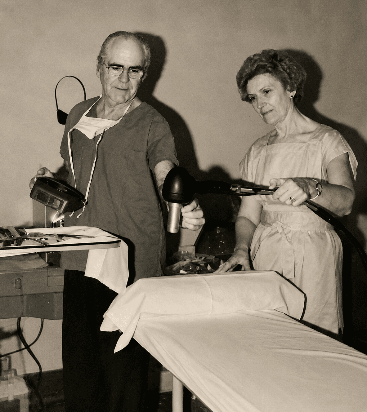 Dr. Gardner and Frances Landers providing medical care on an early mission trip to Haiti